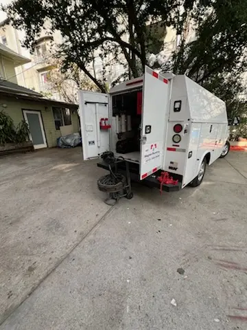 Magnet Plumbing service vehicle on-site for Grease Trap Cleaning in Coconut Creek